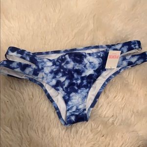Tie-dye blue bikini bottoms from pink